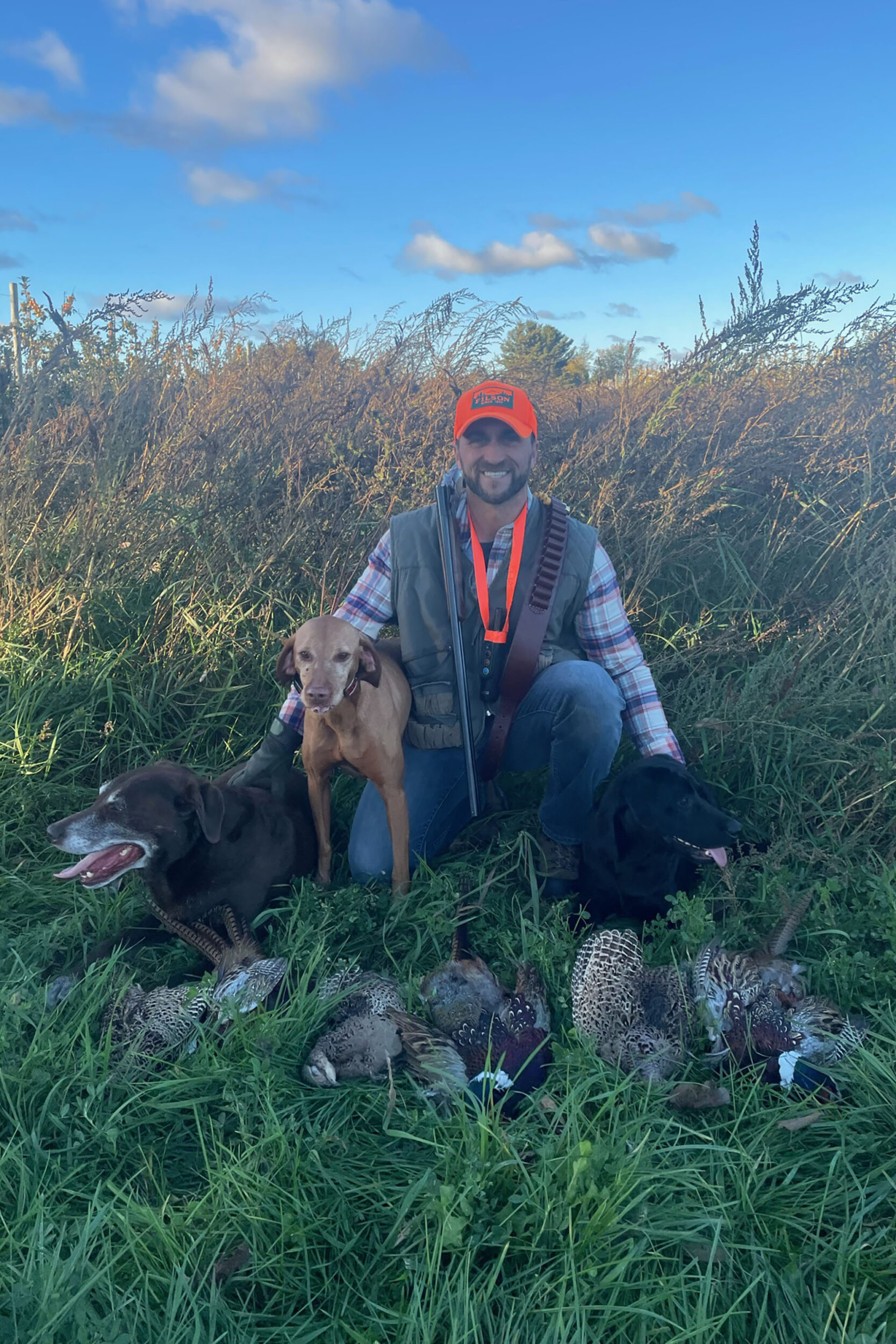 Will with dogs and pheasants royal stag preserve